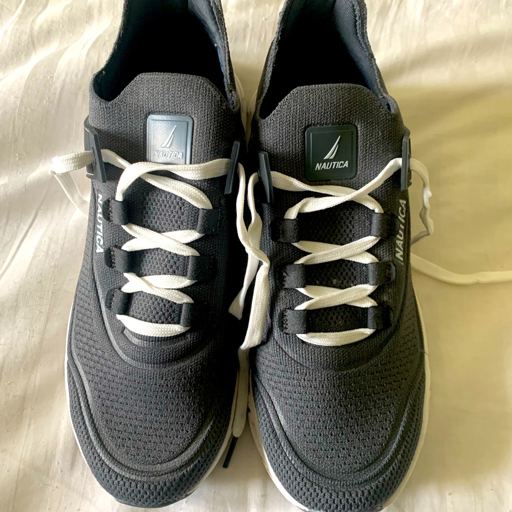 USED BUT NOT ABUSED PAIR OF NAUTICA TENNIS SHOES. SIZE 8 1/2.